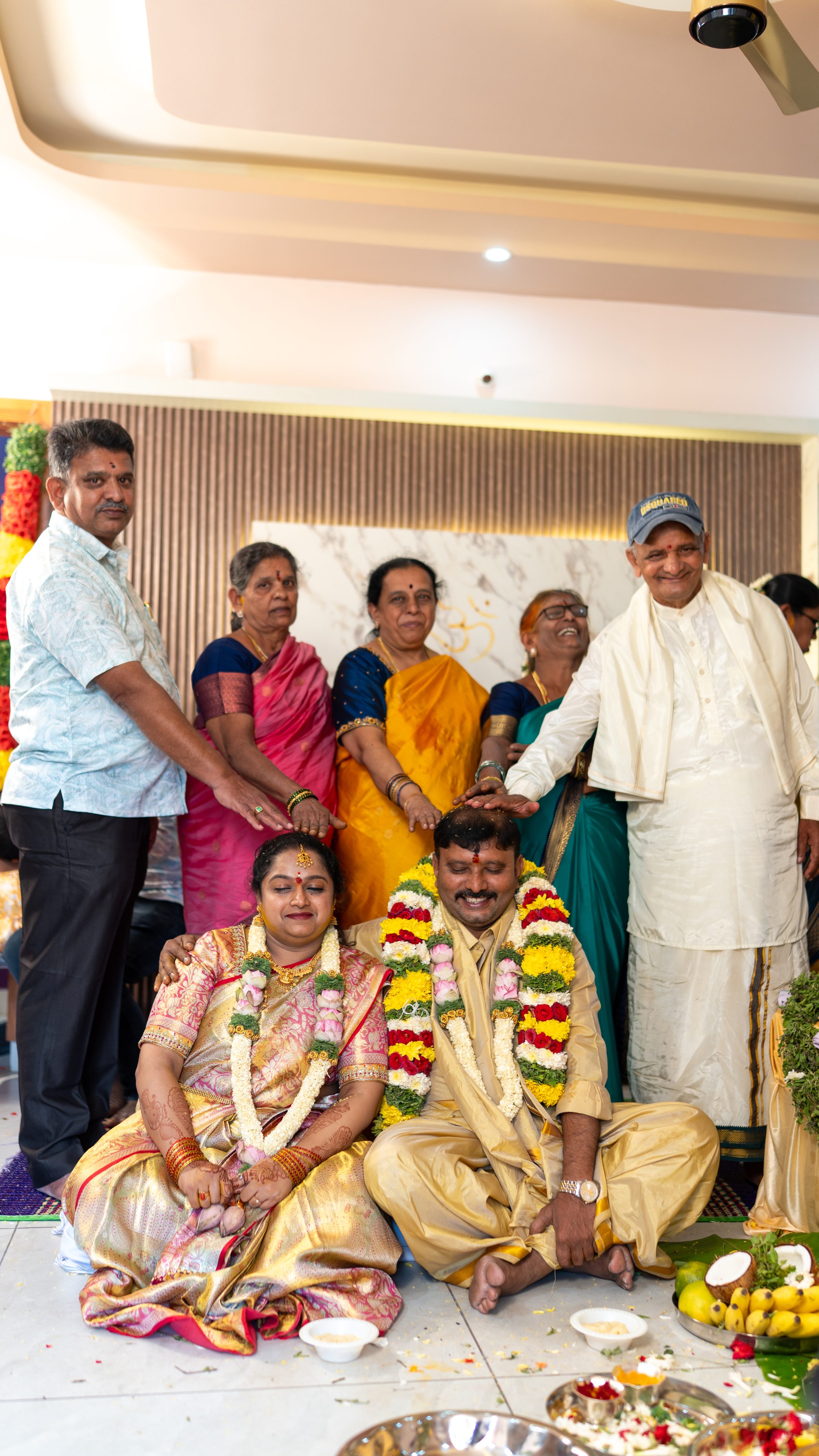 Family during a Gruhapravesha ceremony in Bangalore by Lumeora Studios