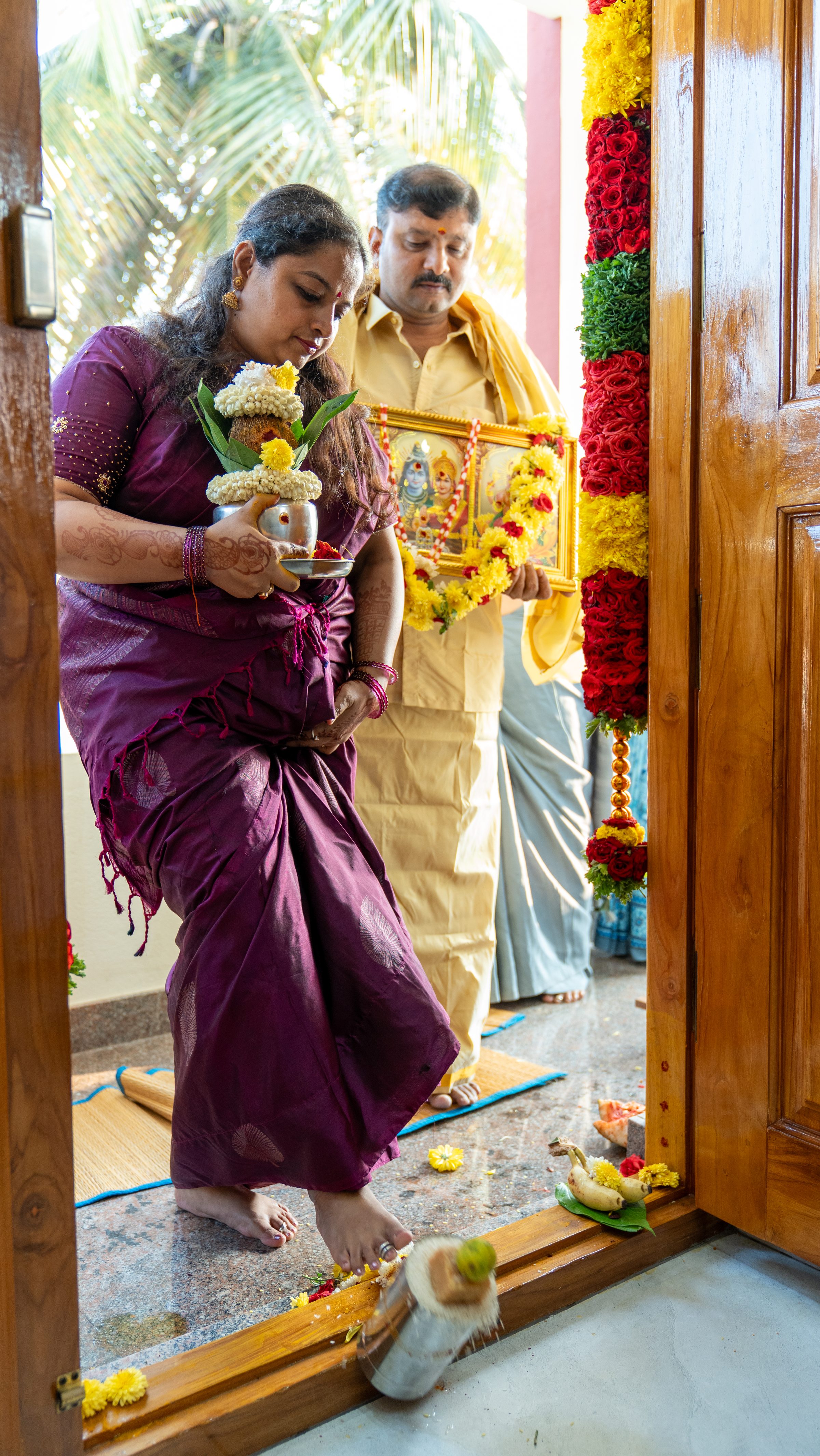 Candid ritual moment during the housewarming ceremony