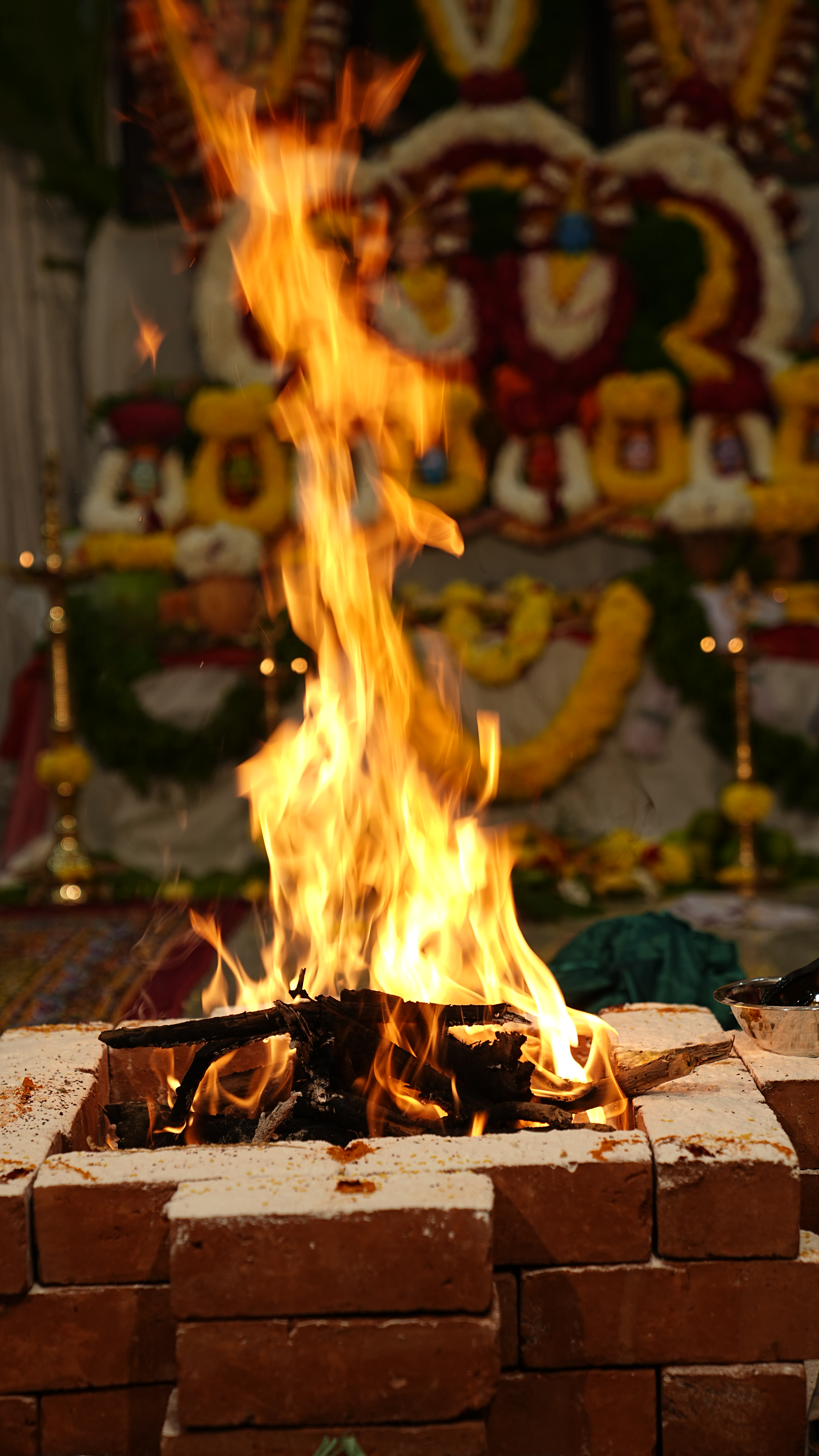 Close-up of the ceremonial fire during a Griha Pravesha housewarming, Bangalore