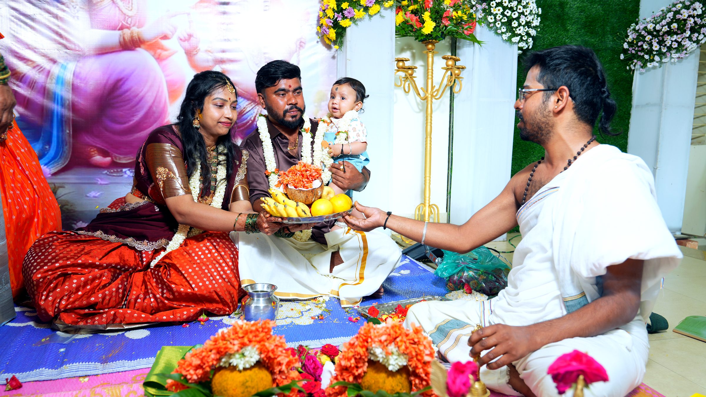 Tender family moment during a naming ceremony in Bangalore