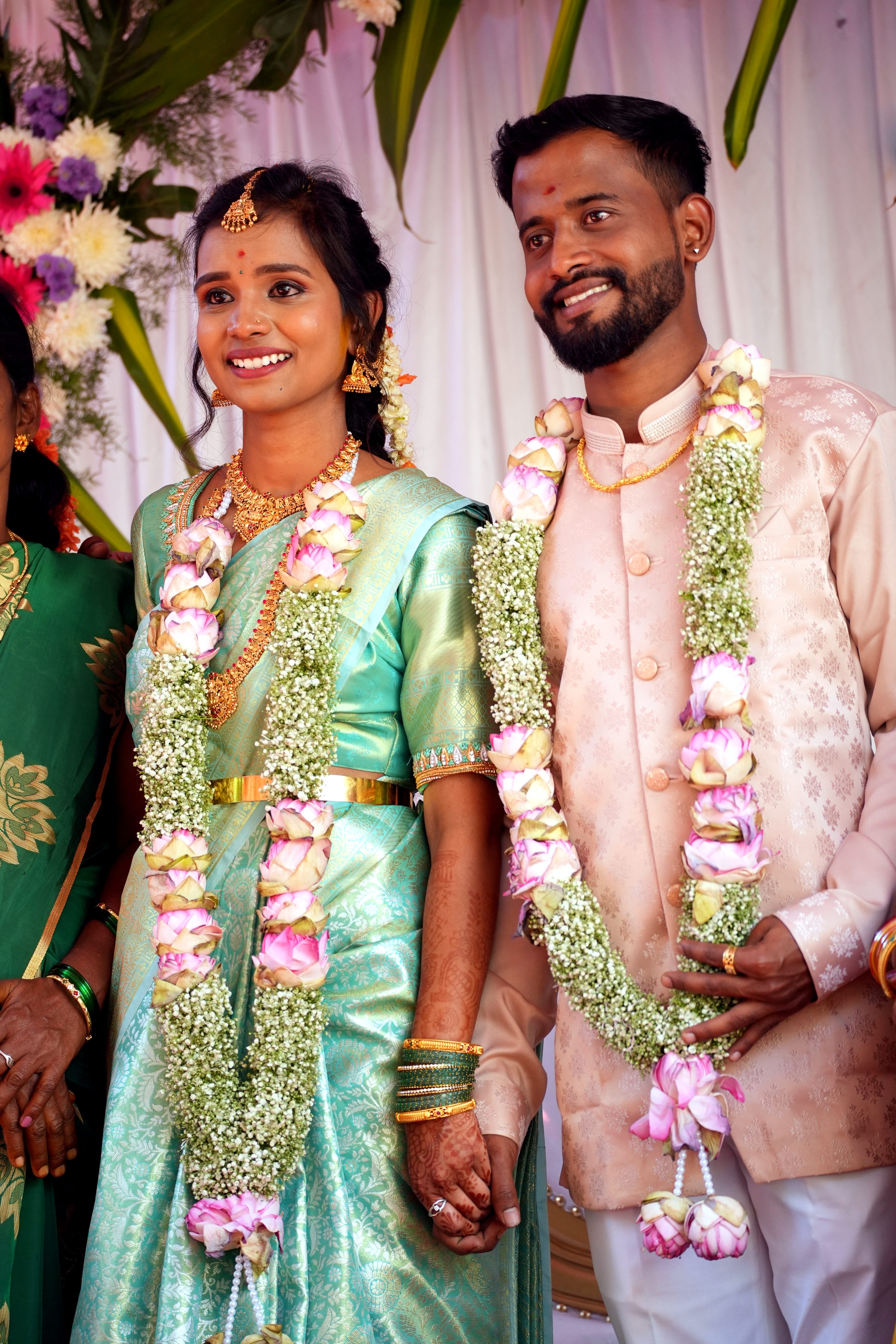 Couple sharing a candid moment during their engagement ceremony in Bangalore