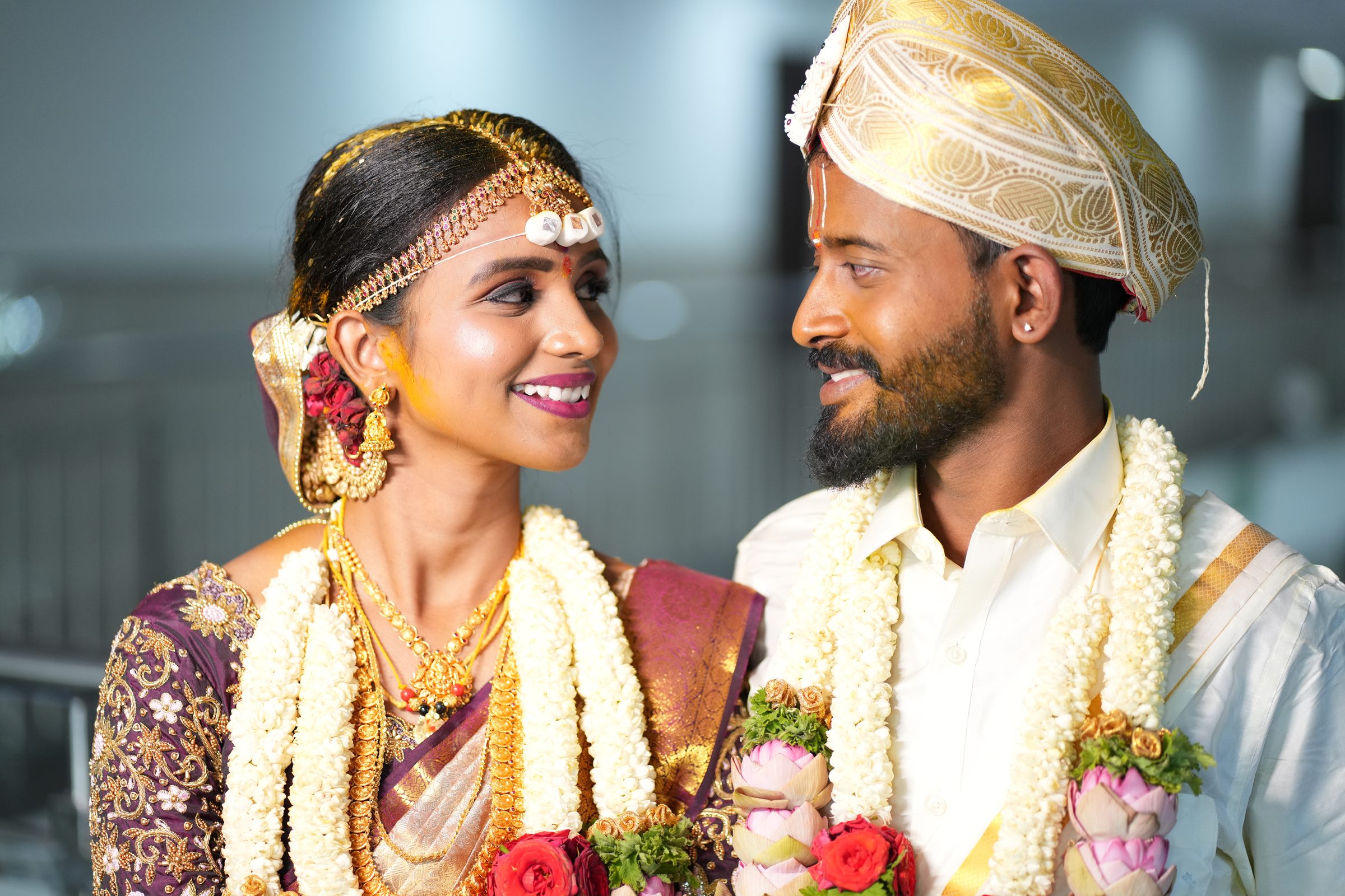Couple exchanging garlands during a wedding ceremony, photographed by Lumeora Studios